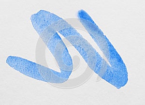 Stroke of blue watercolor paint on white background, top view