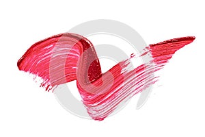 Stroke of red liquid lipstick on white background, cosmetic texture