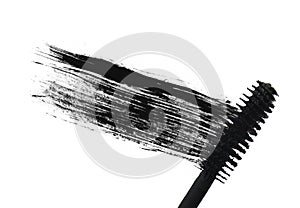 Stroke (sample) of black mascara, isolated on white macro