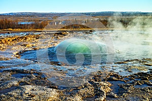 Strokkur about to erupt geyser at Geysir, Iceland