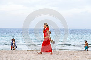 Strollers at the beach