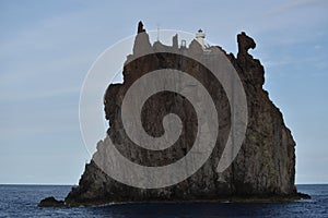 Strombolicchio, sea stack of volcanic origin, Aeolian Islands, Sicily, Italy, with lighthouse