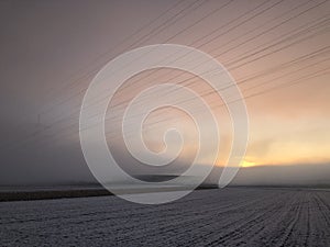 Stromleitungen im Nebel - Power lines in the fog