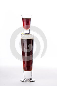 Strong alcohol cocktail jager bomb two glasses liquor and beer isolated on white background