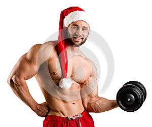 Strong ans Santa Claus with muscular body in red and white christmas santa hat, isolated, white background