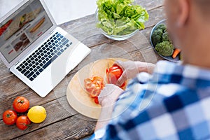 Strong appealing man immersing in biohacking nutrition