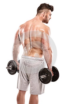 Strong Athletic Man Fitness Model posing back muscles, triceps,