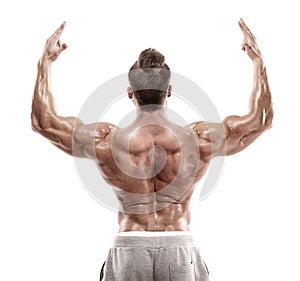 Strong Athletic Man Fitness Model posing back muscles, triceps,