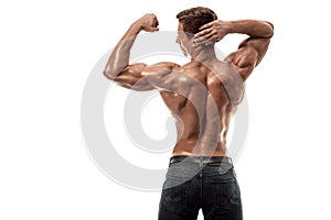 Strong Athletic Man Fitness Model posing back muscles, triceps over white background. Copy space