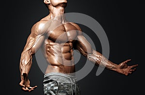 Strong Athletic Man Fitness Model Torso showing six pack abs.