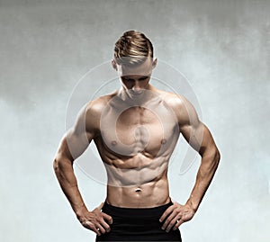 Strong Athletic Man Fitness Model Torso showing six pack abs.