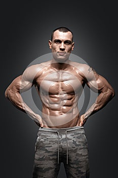 Strong Athletic Man Fitness Model Torso showing six pack abs.