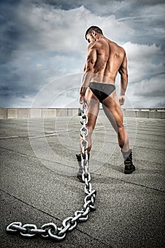 Strong bodybuilder with chain