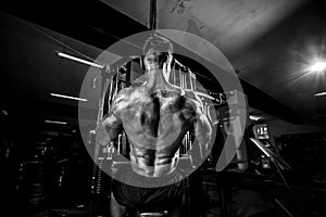 Strong Bodybuilder Doing Heavy Weight Exercise For Back