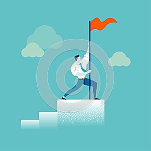 Strong businessman holding a red flag on top of the column graph. Business concept of leadership, success, victory, goal