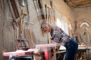 Strong carpenter woman