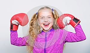 Strong child boxing. Sport and health concept. Boxing sport for female. Sport upbringing. Skill of successful leader