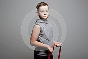 Strong Child. Little Boy with fitness Tape. Sport Boy