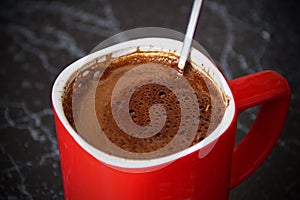 Strong coffee, home made, red cup.