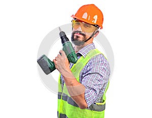 Strong construction worker in protetive helmet and glasses with a screwdriver.