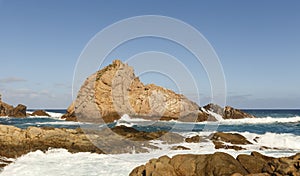 Strong current of water rushing through the rocks at canal rocks