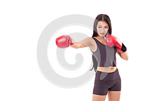 Strong fitness woman boxer or fighter punching