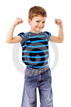 Strong kid showing the muscles