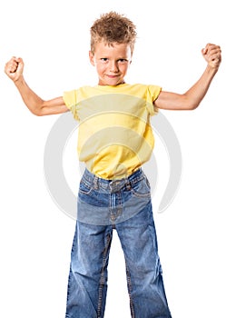 Strong kid showing the muscles