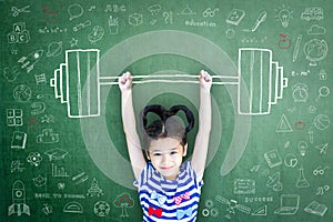 Strong kid with weight lifting doodle on chalkboard for equal opportunity awareness on gender and children rights concept