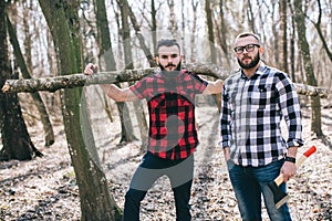 Strong lumberjack chopping wood