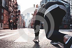 Young runner in strat pose on New York streets photo