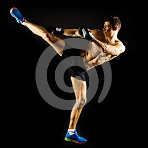 Strong man doing a high kick