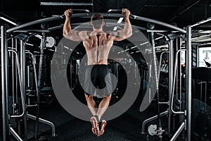 Strong man doing pull ups