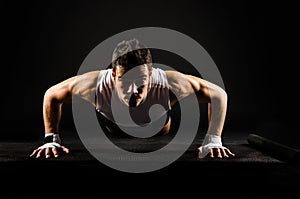 Strong man doing push-ups