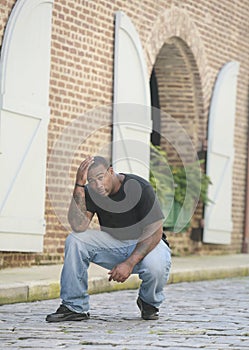 Strong man on street