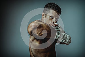 Strong man street fighter, by the hand wound rope.