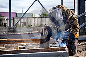 A strong man welder