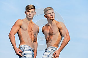 Strong muscles emphasize masculinity sexuality. torso attractive macho. Attractive twins. Men muscular athlete
