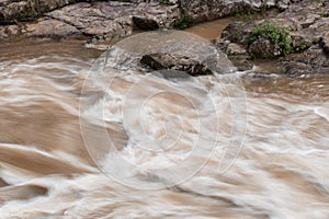Strong river with rock