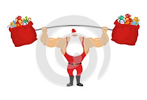 Strong Santa Claus holding barbell and gift bag.