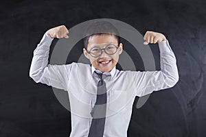 Strong student shows his muscle