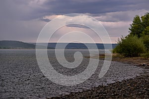 Strong summer storm. Water bubbles formed on the surface of the lake due to heavy rain