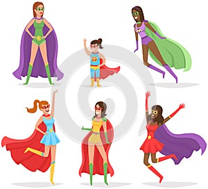 Strong superwoman team in colored costumes with cloaks, emblems, masks has superpowers save world photo