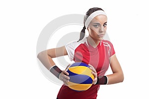 Strong Willed Caucasian Professional Female Volleyball Player Equipped in Volleyball Outfit Holding Ball