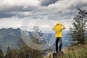 Woman wearing sports clothing during hiking in wilderness
