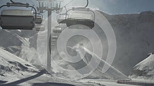 Strong wind storm chair lifts do not work on top of ski resort Gorky Gorod 2200 meters above sea level stock footage