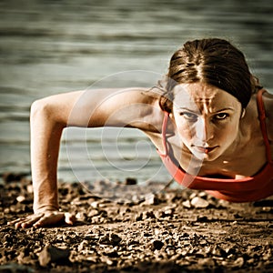 Strong woman doing pushup