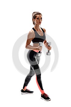Strong woman exercising with dumbbells for arms. Photo of woman working out with dumbbells on white background.