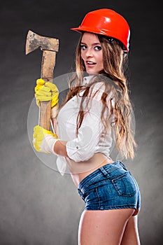 strong woman feminist with axe working.