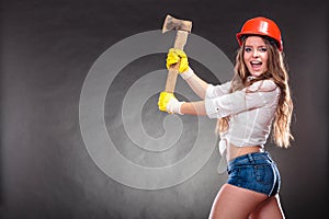 strong woman feminist with axe working.